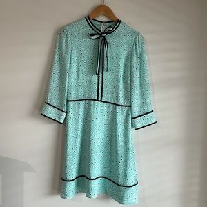 Daisy print dress with bow neck detail